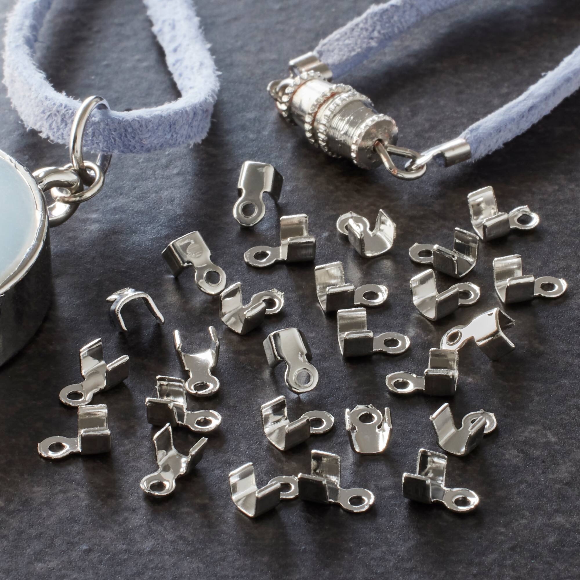 12 Packs: 62 ct. (744 total) 5mm Rhodium Crimps with Loops by Bead Landing™